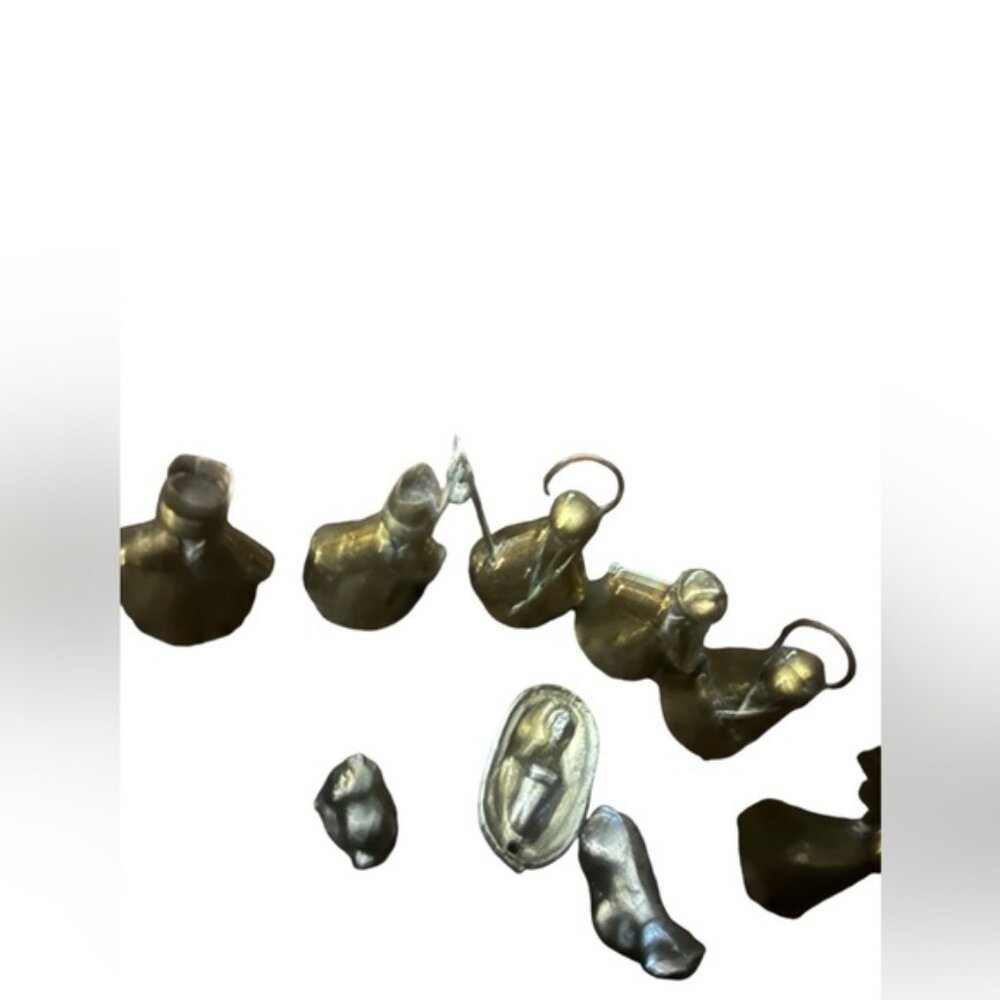 Brass nativity scene manger and animals is not brass but a heavy metal type